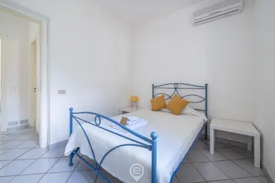 Letto o letti in una camera di Villa Chiara