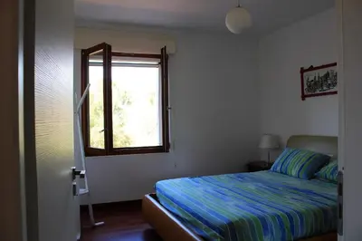 Letto o letti in una camera di Villa Antonella