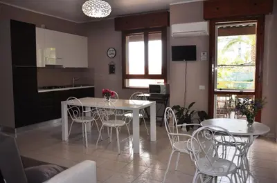 Area soggiorno di Marcella House - Suites near the beach