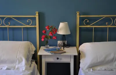 Letto o letti in una camera di Marcella House - Suites near the beach