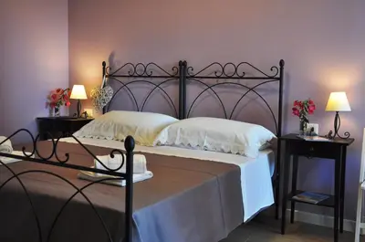 Letto o letti in una camera di Marcella House - Suites near the beach