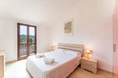 Letto o letti in una camera di South Sardinia Holidays, 5 minutes to Chia