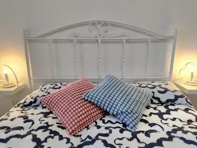 Letto o letti in una camera di Le Coccinelle