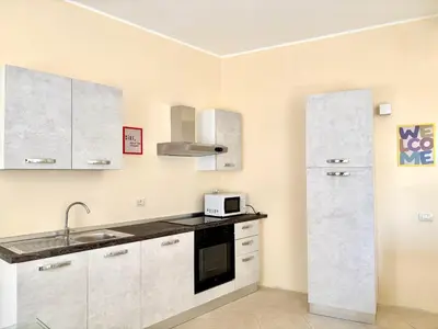 Cucina o angolo cottura di Cagliari Downtown - Piazza Martiri suite