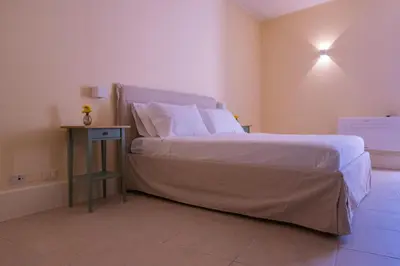 Letto o letti in una camera di Cagliari Downtown - Piazza Martiri suite