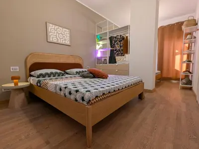 Letto o letti in una camera di Karubi Urban Living