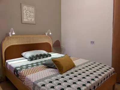 Letto o letti in una camera di Karubi Urban Living