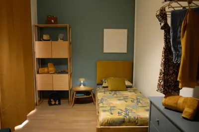 Letto o letti in una camera di Karubi Urban Living