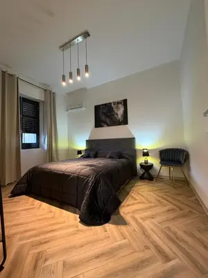 Letto o letti in una camera di Casa Amore Design - South Sardinia -