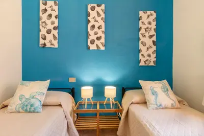 Letto o letti in una camera di 600m from the beach - Garden and Sea View