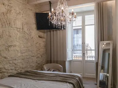 Letto o letti in una camera di Cielo Cagliari For 2 - Only adults