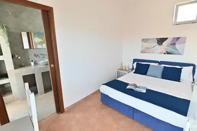 Letto o letti in una camera di IzzHome Sea Style Room