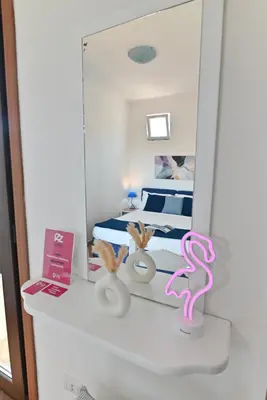 Letto o letti in una camera di IzzHome Sea Style Room
