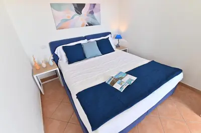 Letto o letti in una camera di IzzHome Sea Style Room