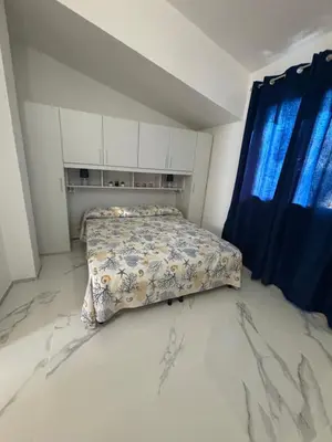 Letto o letti in una camera di Villa Azzurra