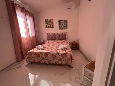 Letto o letti in una camera di Villa Azzurra