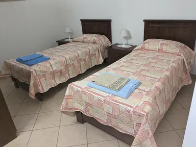 Letto o letti in una camera di Casa Diego