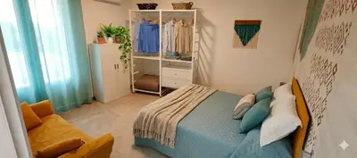 Letto o letti in una camera di Casa Via Marconi