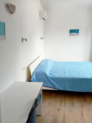 Letto o letti in una camera di Il Borgo