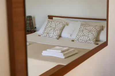 Letto o letti in una camera di Su Suergiu