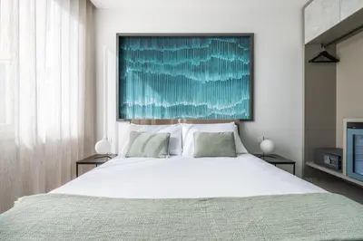 Letto o letti in una camera di Solì Suite & Rooms