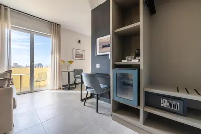 TV o dispositivi per l'intrattenimento presso Solì Suite & Rooms