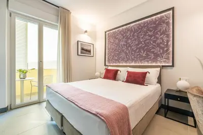 Letto o letti in una camera di Solì Suite & Rooms
