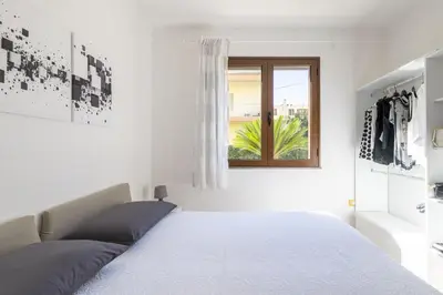 Letto o letti in una camera di MICHI Holiday Home Tortolì