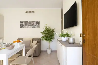 TV o dispositivi per l'intrattenimento presso MICHI Holiday Home Tortolì