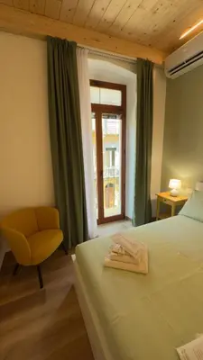 Letto o letti in una camera di Reina 32