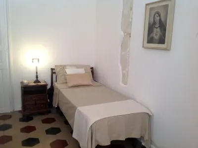 Letto o letti in una camera di Antica Dimora