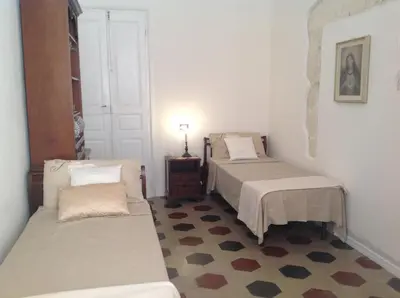 Letto o letti in una camera di Antica Dimora