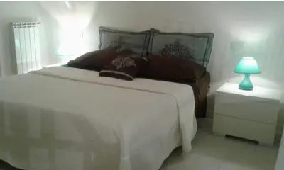 Letto o letti in una camera di Antica Dimora