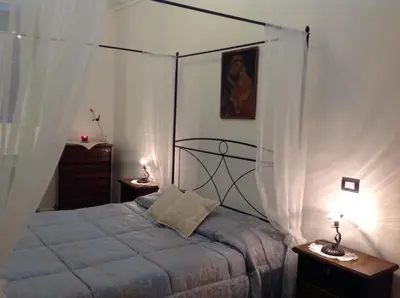 Letto o letti in una camera di Antica Dimora