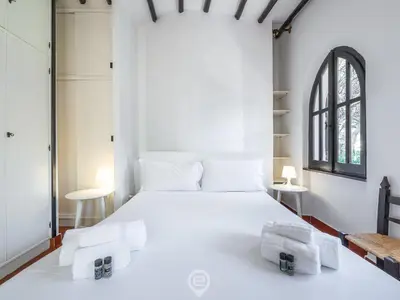 Letto o letti in una camera di Villa Paolina