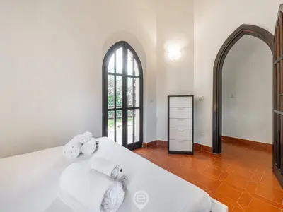 Letto o letti in una camera di Villa Paolina