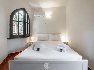 Letto o letti in una camera di Villa Paolina