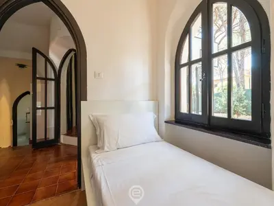 Letto o letti in una camera di Villa Paolina