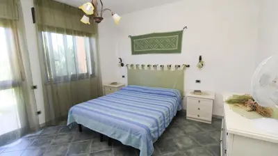 Letto o letti in una camera di Casa Vacanze Giovanna