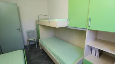 Letto o letti in una camera di Casa Vacanze Giovanna