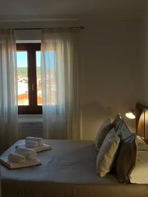 Letto o letti in una camera di Corte 'e Susu - Domo Experience