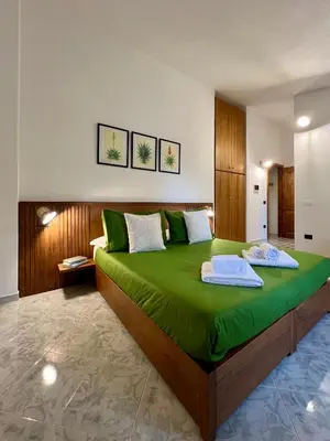 Letto o letti in una camera di Corte 'e Susu - Domo Experience