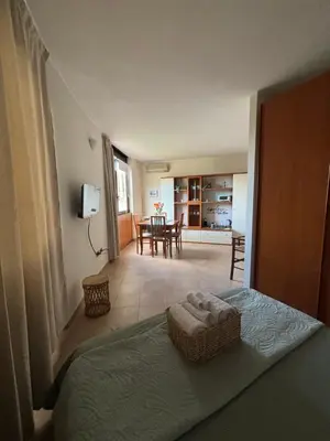 Letto o letti in una camera di La Casetta