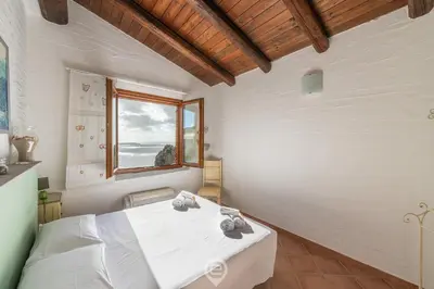 Letto o letti in una camera di Azure Escape Nebida Coast