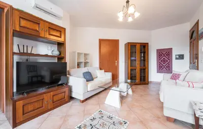 TV o dispositivi per l'intrattenimento presso 2 Bedroom Stunning Apartment In Carloforte