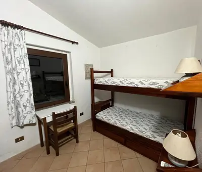 Letto o letti in una camera di Casa Paradiso - Seaview & short walk to beach