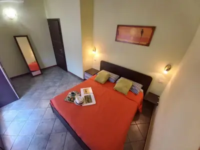 Letto o letti in una camera di Al 28в, Appartamento Teulada