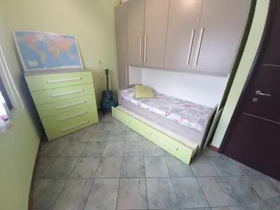 Letto o letti in una camera di Al 28в, Appartamento Teulada