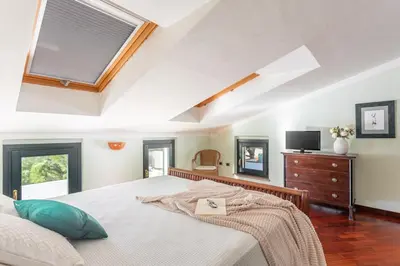 Letto o letti in una camera di Villa Ray - Front row beachfront with garden