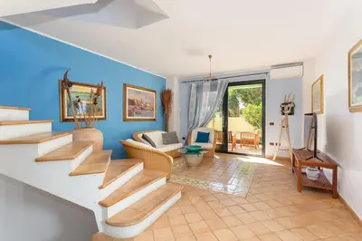 Area soggiorno di Villa Ray - Front row beachfront with garden